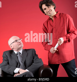 Businessman and an assistant Stock Photo