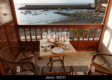 Breakfast table on the balcony of an apartment, Tapahuga, Playa de Santiago, La Gomera, Canary Islands, Spain, Europe Stock Photo