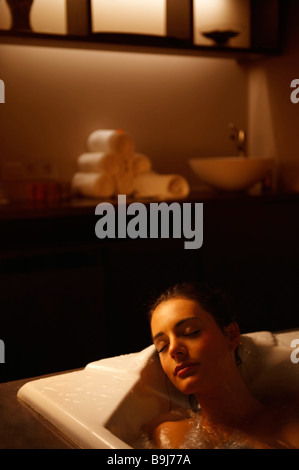Woman in bubble bath Stock Photo