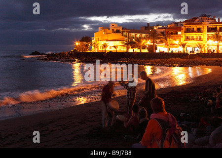 Drummers on the beach in La Playa in the evening, Valle Gran Rey, La Gomera, Canaries, Canary Islands, Spain, Europe Stock Photo