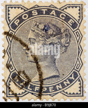 Close up of half penny, ½d, slate blue,Victorian British Postal stamp on white background issued 1883 SG 187, postmarked. Stock Photo