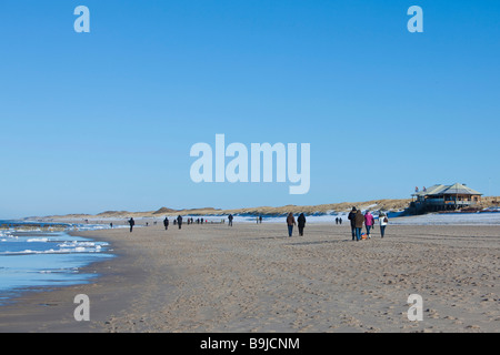 People walking on the beach, in the back the Grand Plage, Kampen, Sylt, North Frisian Islands, Schleswig-Holstein, Germany, Eur Stock Photo