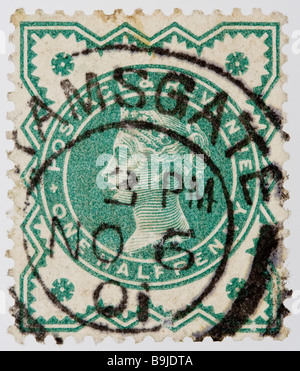 Close up of ½d, one half penny green Victorian British Postal stamp on black background issued 1887-1900, Jubilee Issue. Used. Postmark Ramsgate 1901. Stock Photo