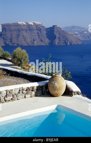 Pool at the crater rib of the volcano in Finikia, view of the caldera and of Imerovgli, Island of Santorini, Thera or Thira, Cy Stock Photo