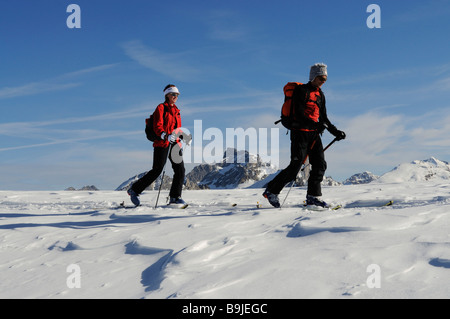 Ski alpinists on Parwengsattel, Sankt Stephan, Zweisimmen, Saanenland, Western Alps, Bernese Oberland, Switzerland, Europe Stock Photo