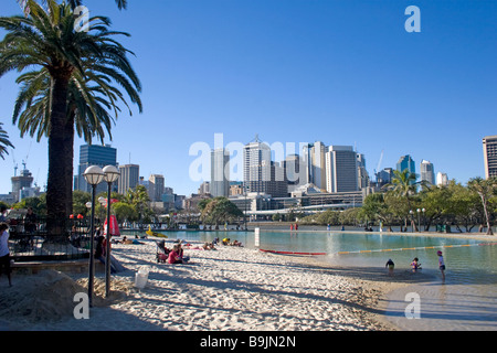 A man made beach in Brisbane has a lookout over the cityscape Stock Photo