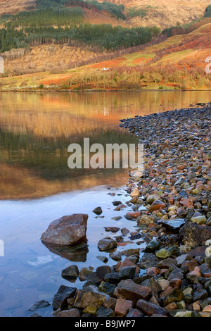 Reflections in Loch Leven at the village of Invercoe near Ballachulish, Glencoe, Argyll, Highlands, Scotland Stock Photo