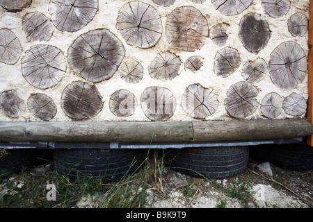 Cord wood wall,sustainable building Stock Photo