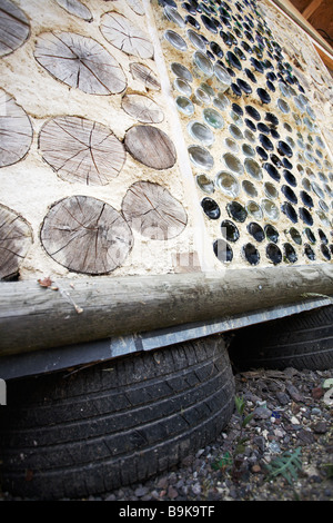 Cord wood wall,sustainable building Stock Photo