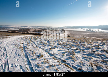 A snowy winter scene. Looking towards Whipsnade Zoo from the ridge path on Ivinghoe Beacon. Stock Photo