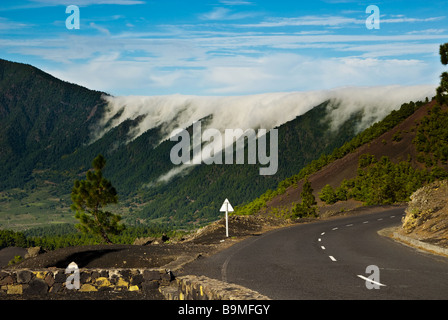 clouds rolling off the mountain in La Palma canary islands spain Stock Photo