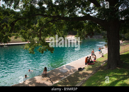 Austin, Texas - swimmers at Barton Springs Pool Stock Photo