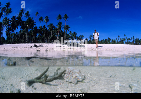 South Pacific Ocean, Samoan Archipelago, Upolu Island, Western Coast, walker on the beach where Return to paradise was shot Stock Photo