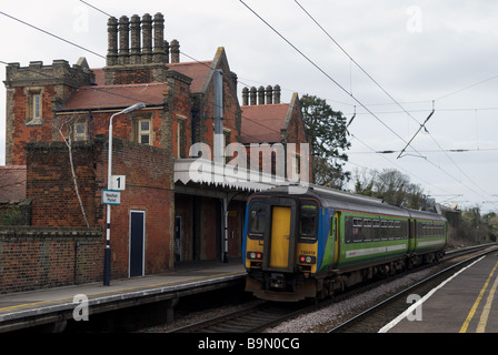 National Express East Anglia passenger rail service from Ipswich to Cambridge arrives at Needham Market, Suffolk, UK. Stock Photo