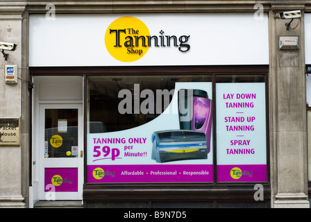 Tanning shop in Manchester city centre UK Stock Photo