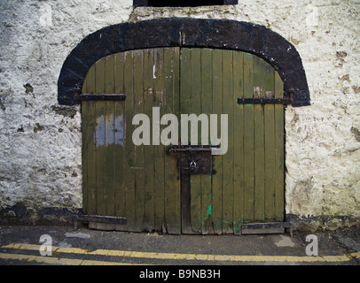 Gate in gable end of outhouse Carlingford Co. Louth Ireland Stock Photo