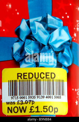 reduced price label on a box of sweets. Stock Photo