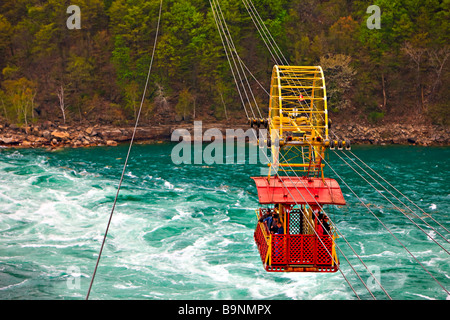 The Spanish Aero Car passing above the Whirlpool Rapids of the Niagara River down stream from the famous Niagara Falls. Stock Photo