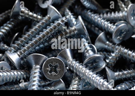 philips head screws posidrive pozidrive full frame close up shot Stock Photo