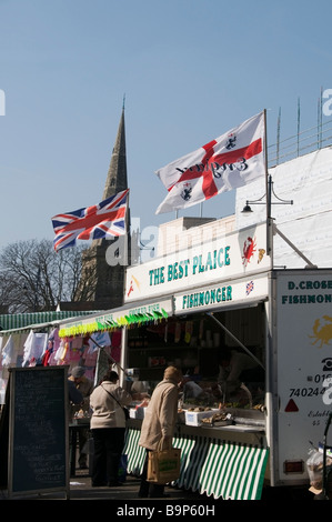 Romford Historic Market Fishmonger shop, signage, English, British flags, black menu board, people, Essex, UK, Europe, EU Stock Photo