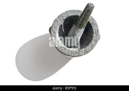 Granite mortar and pestle against a white background Stock Photo