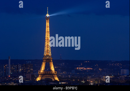 France, Paris, view from Montmartre, the Eiffel Tower illuminated (lighting of the Eiffel Tower by Pierre Bideau, reproduction Stock Photo