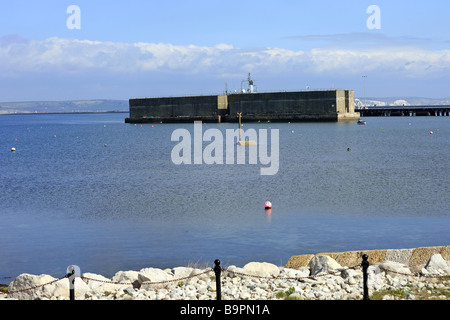 Two sections of Mulberry harbour that was built for D Day in 1944 at Portland docks in Dorset where it was left behind. Stock Photo