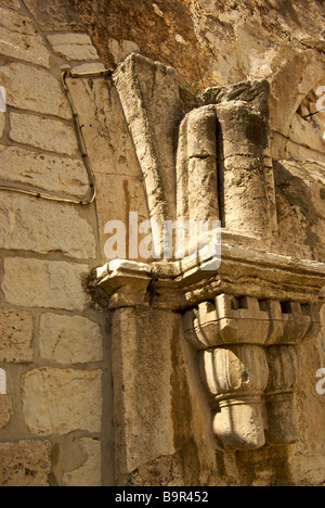 Sculpted limestone decoration on walls in courtyard of Church of the Holy Sepulchre Stock Photo
