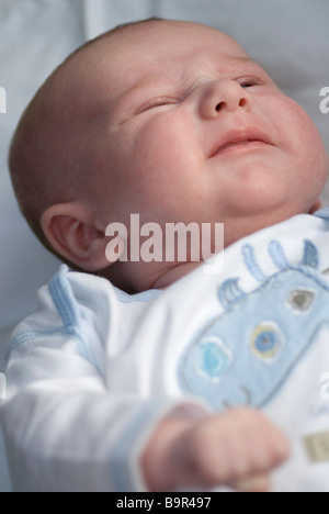 6 week old baby boy beginning to cry Stock Photo