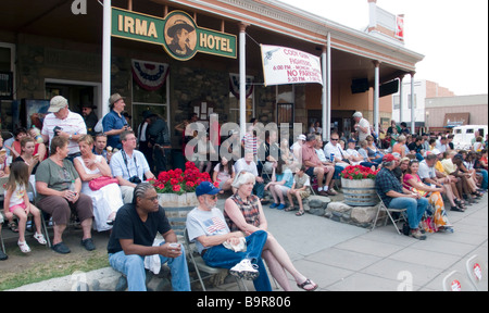 Crowd at gunfight re-enactment outside Irma Hotel Cody Wyoming USA Stock Photo