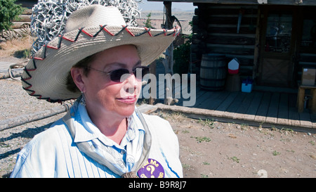 Woman in period western clothes at historic Old Trail Town Cody Wyoming USA Stock Photo