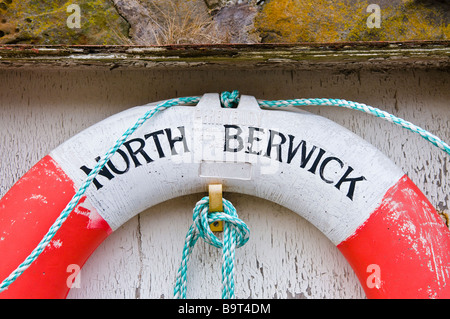 A lifebelt on the harbour at North Berwick, Scotland Stock Photo