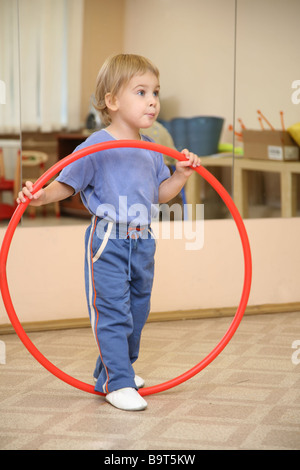 little girl and hoop Stock Photo