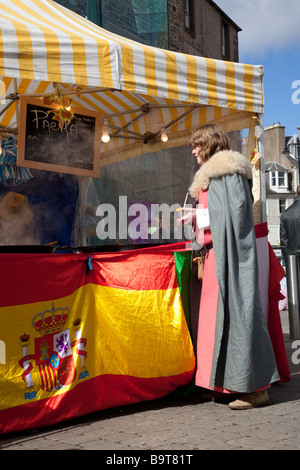 Woman buying Paella from market Stall at Hawick Reivers Festival, Scottish Borders, Hawick in Scotland, UK Stock Photo