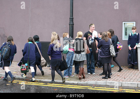 Teenagers coming from school in Enniskillen, Co. Fermanagh Northern Ireland UK Stock Photo