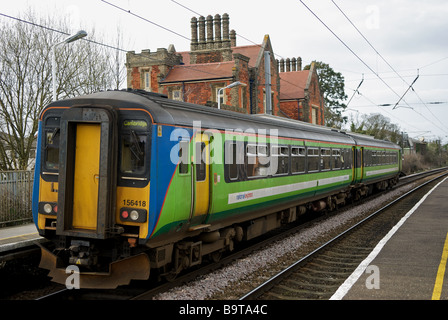 National Express East Anglia passenger rail service from Ipswich to Cambridge arrives at Needham Market, Suffolk, UK. Stock Photo