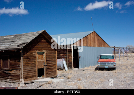 Old Shack Old Truck and Old barn in the Nevada desert Stock Photo