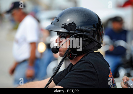 Daytona Beach Florida Biker Week motorcycle pilgrimage man wearing helmet with communication headset Stock Photo