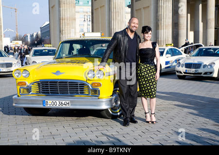 Dwayne Johnson US actor and Actress Carla Gugino in front of the Brandenburg gate in Berlin on Tuesday March 31 2009 Stock Photo