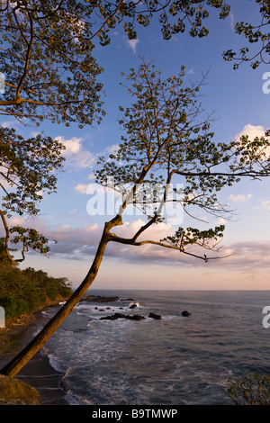 Waves break along the Pacific coast at the surf haven of Playa Hermosa just 5 km south of Playa Jaco in Puntarenas province, Costa Rica. Stock Photo