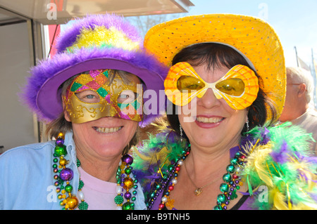 White Female Senior Citizens Costumed participants in Lake Wales Mardi Gras Celebration Central Florida United States Stock Photo