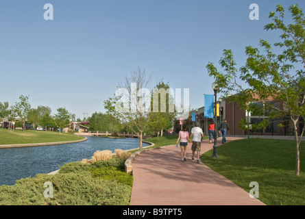 Colorado Pueblo Historic Arkansas Riverwalk of Pueblo two couples walking Stock Photo