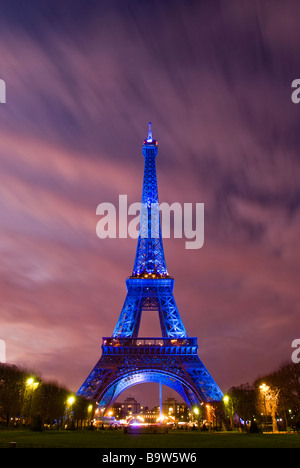 View of the Eiffel tower illuminated in blue displaying the European symbol due to the French presidency of the European Union Stock Photo