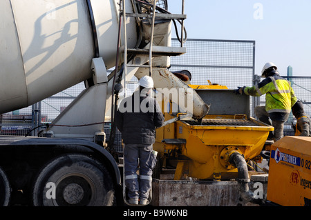 Paris France, Construction Site in 'Paris Rive Gauche' Site, Construction Workers Pouring Concrete Lafarge French Truck Stock Photo