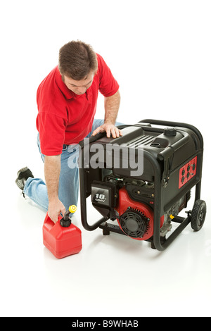 Man preparing to fill his gasoline powered generator with fuel Isolated on white  Stock Photo