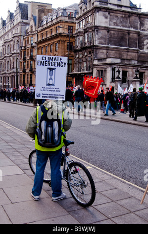 Climate Emergency cyclist at the Put People First protest Stock Photo