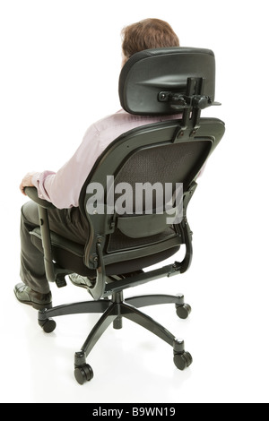 Executive sitting in a fully adjustable ergonomic office chair Full body isolated on white  Stock Photo