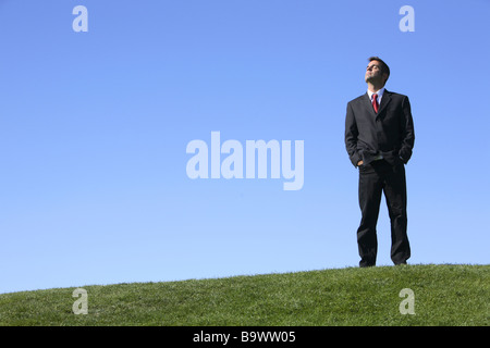 Businessman standing outdoors with copyspace Stock Photo