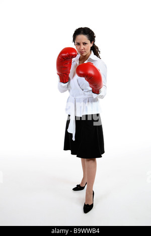 Business woman with boxing gloves isolated on white Stock Photo
