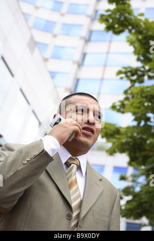 Hispanic businessman on cell phone Stock Photo